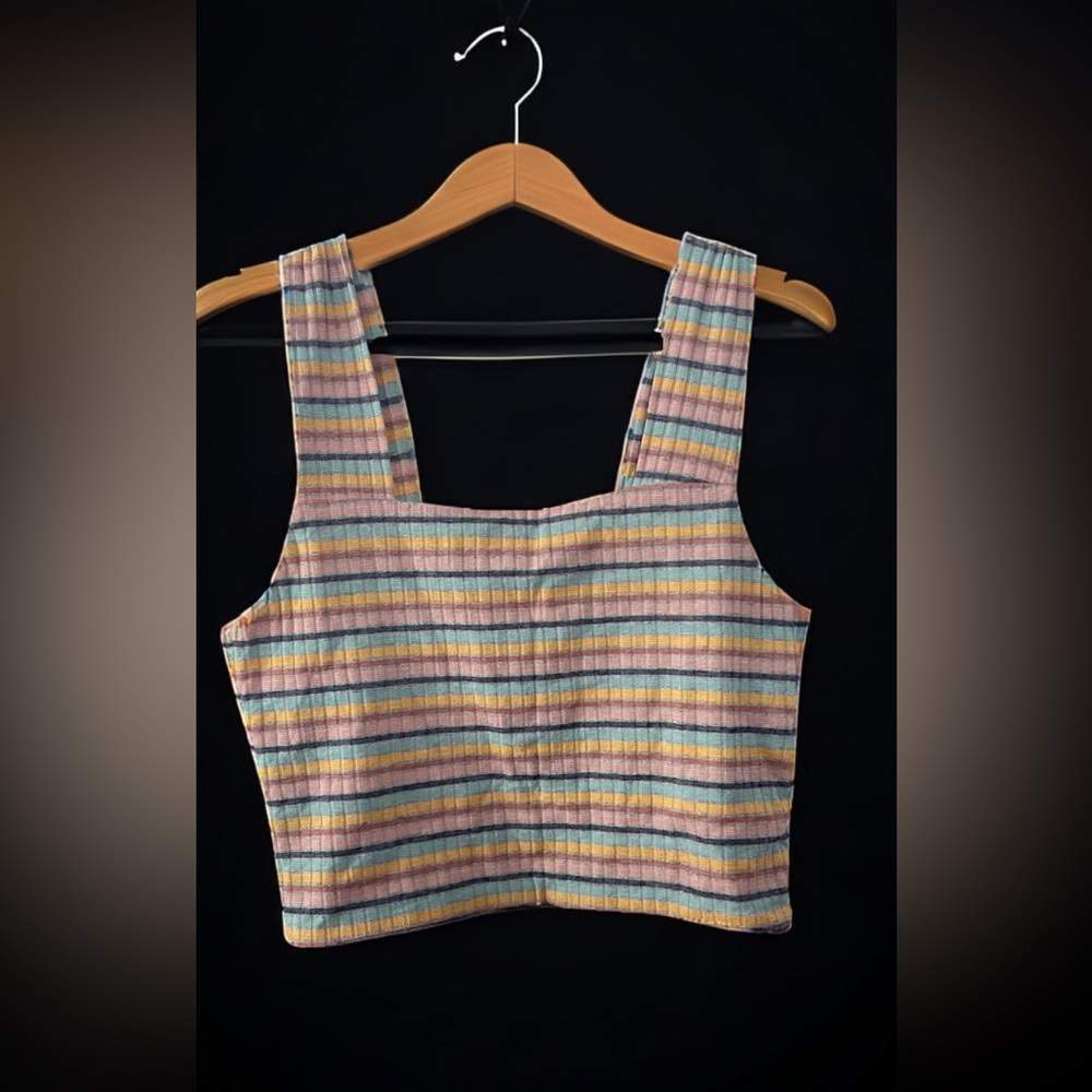 Never worn. Soft comfortable material. A bit cropped.